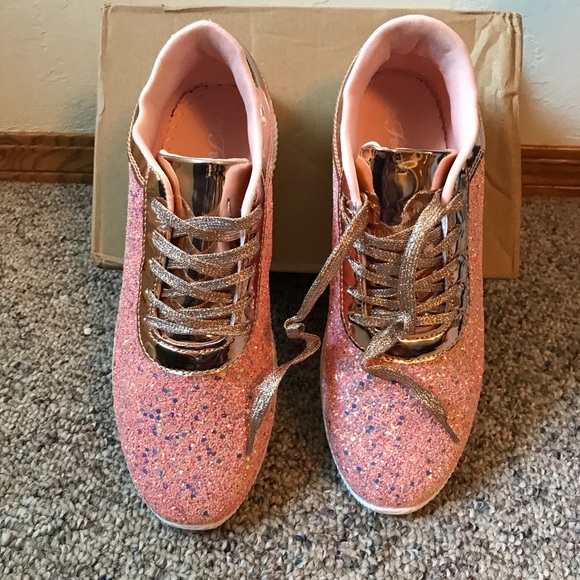 pink and gold tennis shoes